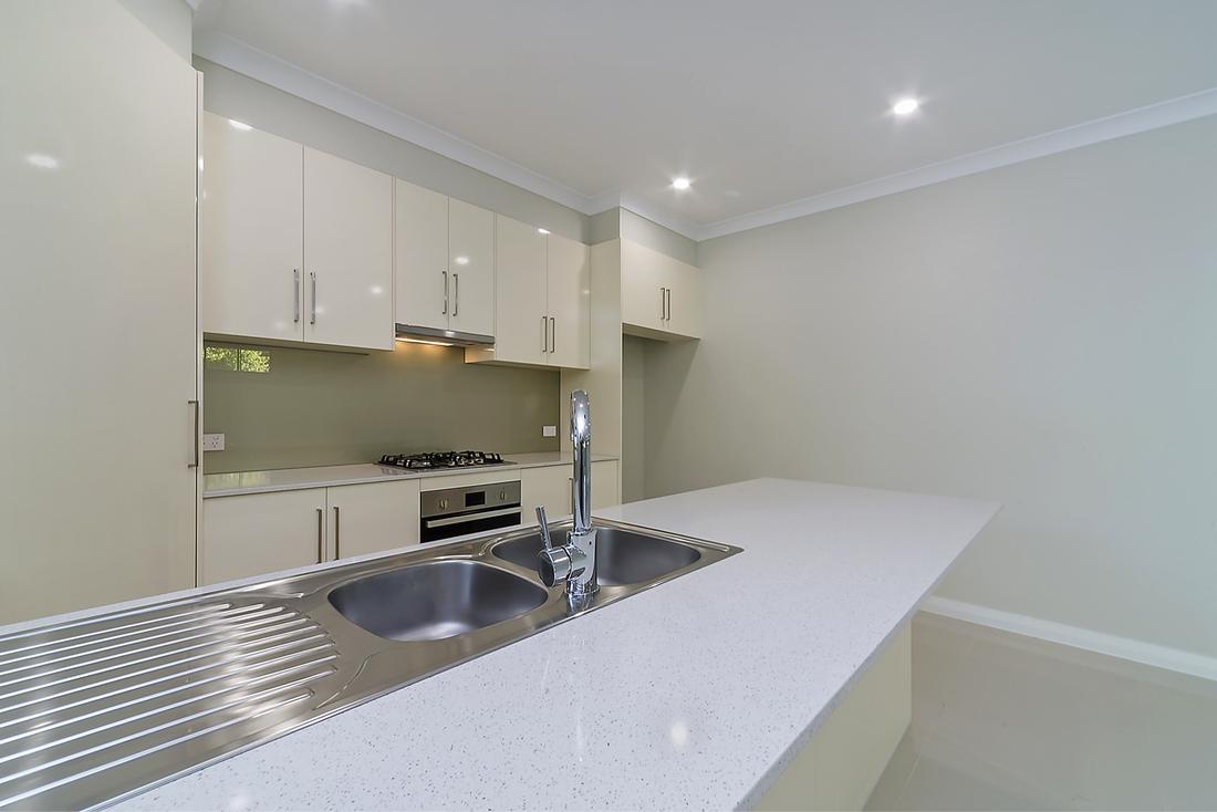 Finished kitchen with a gas cooktop and double sink in Gawler East